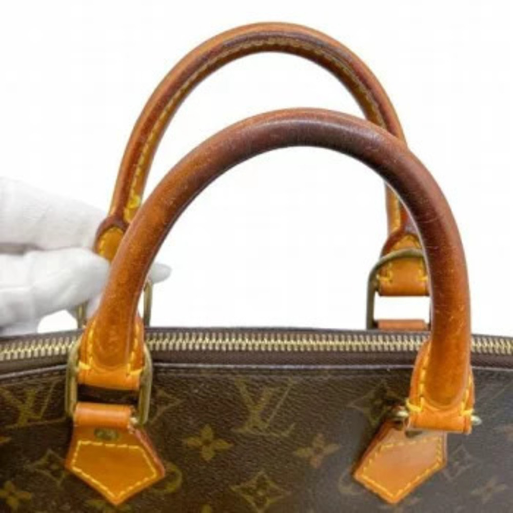 Louis Vuitton Alma Monogram Handbag - Picture 8 of 10